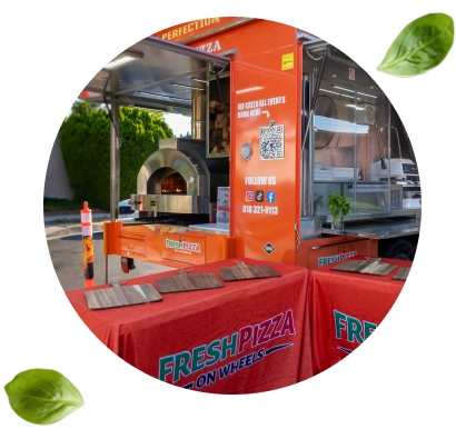 Fresh Pizza on Wheels food truck with wood-fired brick oven serving pizza